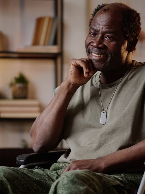 Portrait of Smiling Black Veteran with Disability